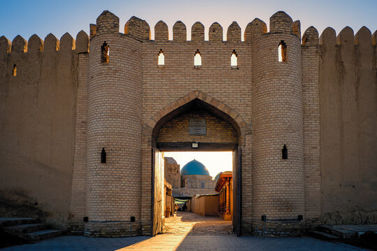 Great view of the citadel of Turkistan, Kazakhstan, through the medieval gate, with the incomplete mausoleum of Khoja Ahmed Yasawi in the background