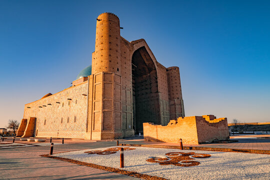 Stunning sunset view of the incomplete Mausoleum of Khoja Ahmed Yasawi in Turkistan, Kazakhstan, an unique masterpiece in Timurid architecture