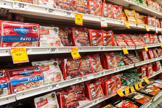 Villa de Alvarez, Colima, Mexico. March 6, 2026: Abundant Supermarket Shelves Displaying Various Packages of Sausage Products