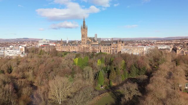 Drone view of Kelvingrove Park and Gilmorehill on a sunny golden hour winter morning in Glasgow Scotland
