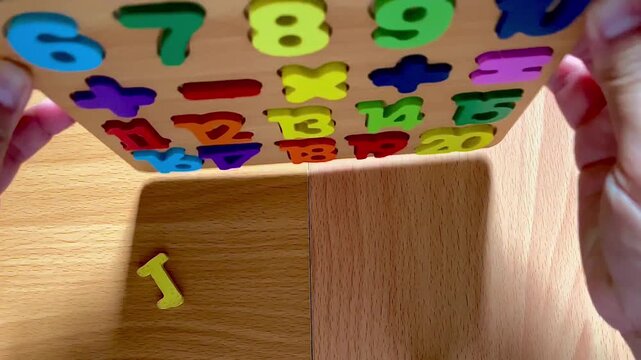 Educational Wooden Number Puzzle Board with Colorful Digits and Mathematical Symbols for Kids Learning
