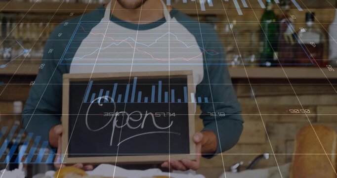 Barista raising Open sign, adjusting twice, smiling to signal opening amid noninteractive 3D charts