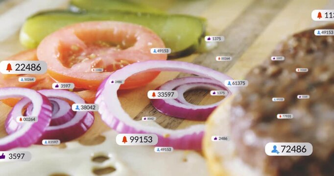 Floating badges appearing above onion rings then drifting toward cheese, patty, showing engagement