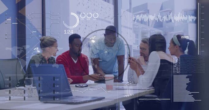 Leaning man in light-blue polo pointing at documents on table, guiding project plan with overlays