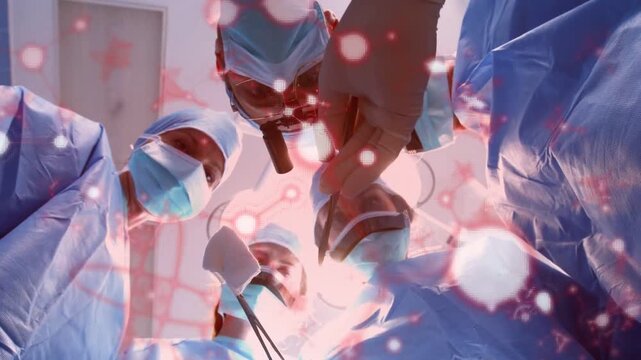 Vertical video: Lead MD reaching down for surgery team handing forceps and gauze overlay drifting