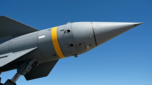 Close-up of a missile on a launcher, ready for deployment.