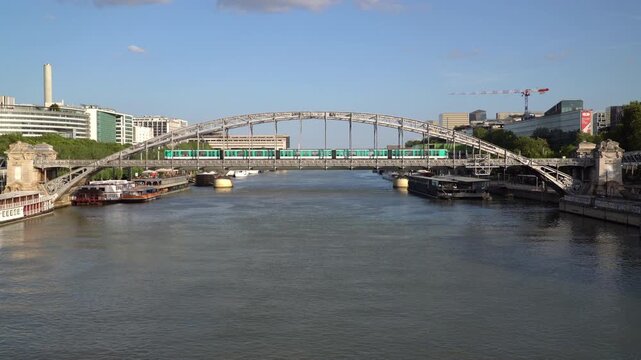 Austerlitz Viaduct, a steel arch rail bridge over Seine river in Paris, France.