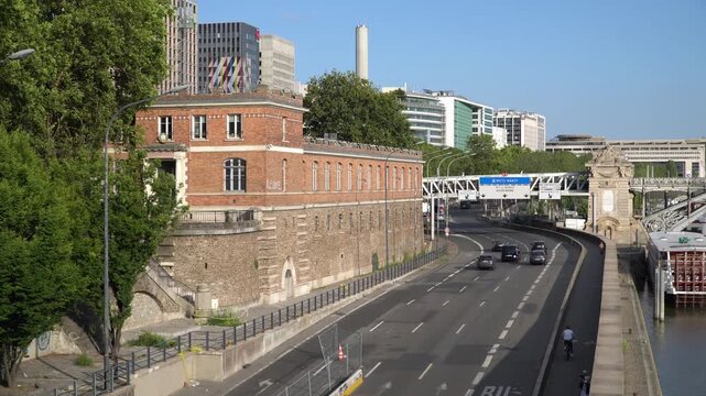 High angle street traffic in 12th arrondissement Paris, France. Blue sky, sunny summer day.