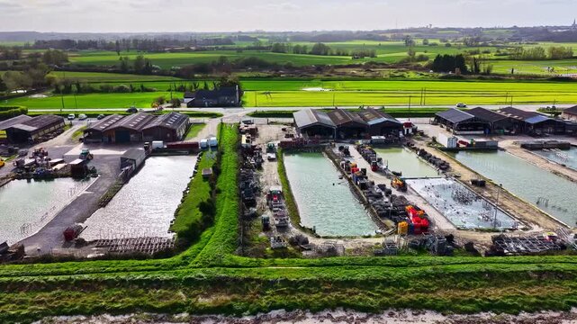 Oyster farm water basins and rural landscape scenery in Cancale France