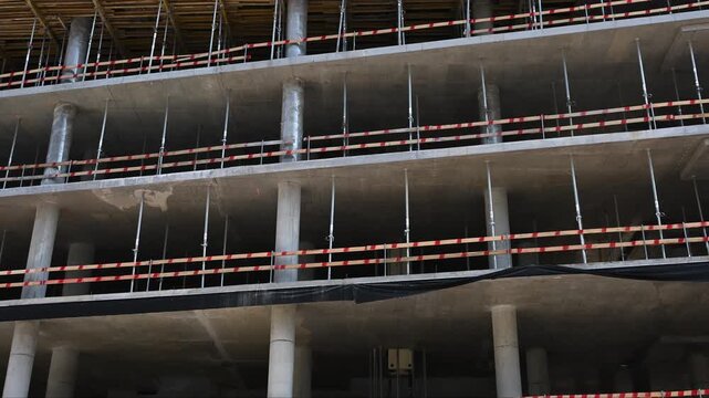 Construction site, concrete slabs and scaffolding