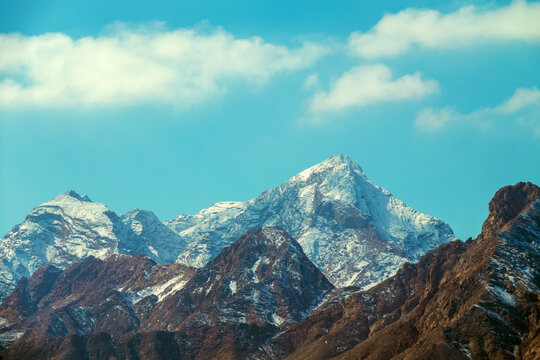 Plvar and Kerman old weathered mountains. Polvar moumtains old weathered mountains, autumn and the first snow at the top. Iran