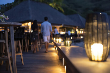 Obraz premium A serene beachside dining experience is illustrated with soft lighting and cozy seating, inviting guests to enjoy a perfect evening in a picturesque coastal setting.