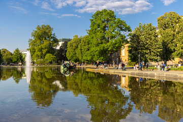 Fototapeta premium Reflections in Eckensee, Stuttgart