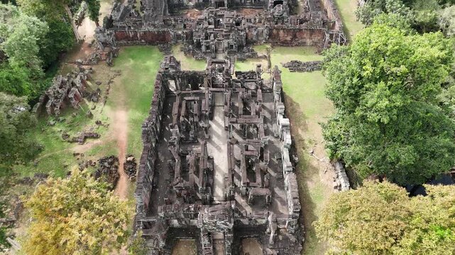 Low altitude drone flight revealing the layout of Banteay Kdei ruins, Siem Reap