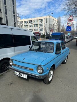 An old blue Soviet ZAZ-968M Zaporozhets car