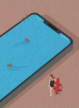 Woman with inflatable hashtag symbol beside shark infested smartphone swimming pool
