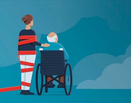 Carer tied up in red tape next to man in wheelchair 