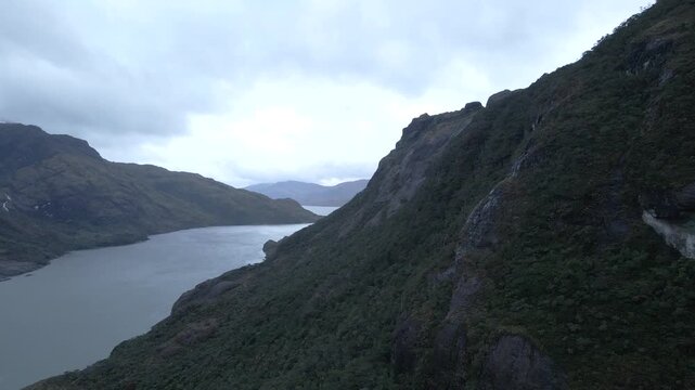 Calbuco chile patagonia river lake nature mountain trees clouds winter dusk morning drone