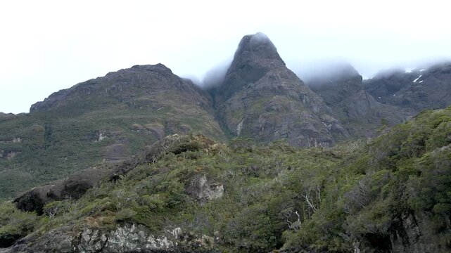 Calbuco chile patagonia river lake nature mountain trees clouds winter dusk morning drone