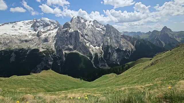 Walk along the Viel dal Pan with magnificent view of Marmolada massive in Italian Dolomites.