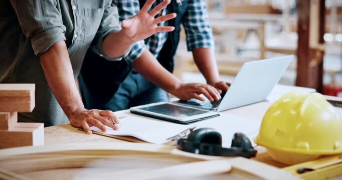 Hands, carpenter and men with laptop in warehouse for inventory, meeting or furniture production. Woodworking, people and tech for online update with timber supply, lumber and construction business