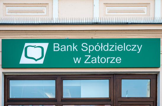 Auschwitz, Poland - Sign and facade of the Spoldzielczosci bank, a commercial and cooperative bank