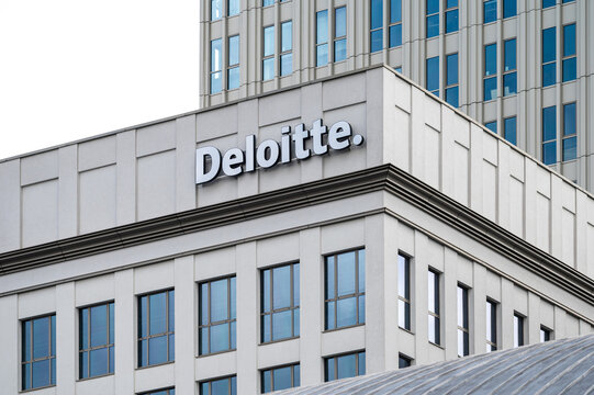Krakow, Poland - Deloitte sign at the Unity Tower, an accountancy and auditing company
