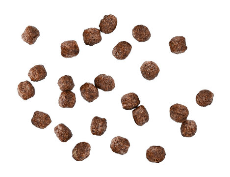 Scattered chocolate corn balls breakfast isolated on a transparent background. Full depth of field. PNG.