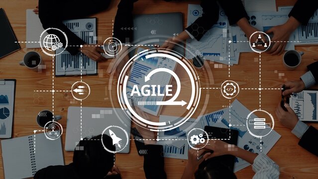 A dynamic office scene showcasing team collaboration in agile project management, with charts and technology illustrating innovative business strategies and growth. Raster