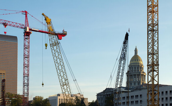 Construction Cranes with Colorado State Capitol in Denver