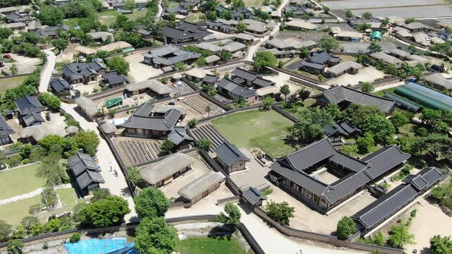 Aerial rising pull-back from Hahoe Folk Village revealing the S-shaped Nakdong River bend, Andong, South Korea
