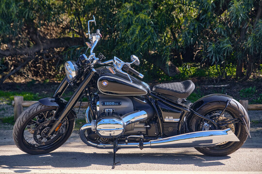 Motorcycle Culture And Leisure Black BMW R18 Cruiser Bike Parked Outdoors In Sotogrande Andalucia Spain For Road Trip Adventure Or Personal Transportation