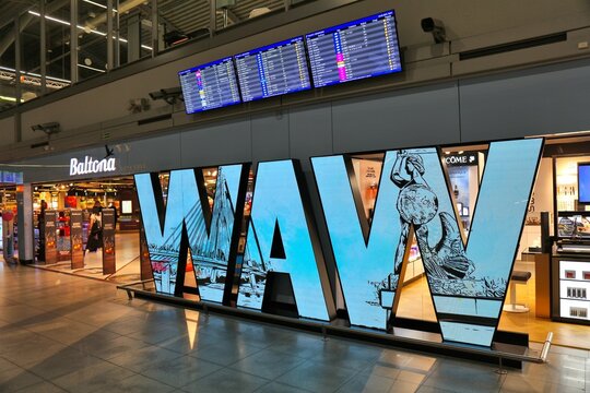 WARSAW, POLAND - MARCH 24, 2023: Terminal interior view of Warsaw Airport (IATA code: WAW) in Poland.