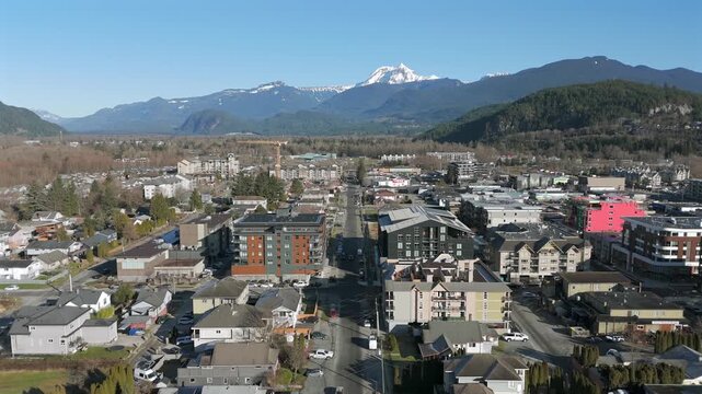 Residential Neighbourhood With Housing Development In Squamish, British Columbia, Canada. Aerial Pullback Shot