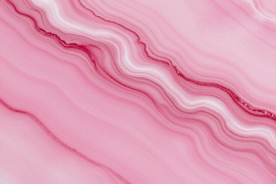 a close up of a pink marble surface