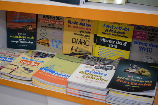 New Delhi, India, January 10 2026 - Variety of Books on shelf inside a book-stall at Delhi International Book Fair, Selection of books on display in Annual Book Fair at Bharat Mandapam complex