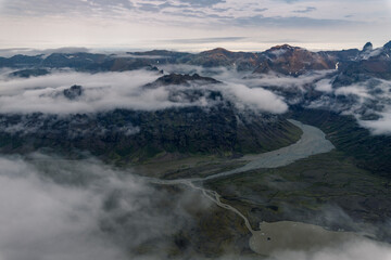 Obraz premium view from the mountain Kristínartindar to the valley in the clouds