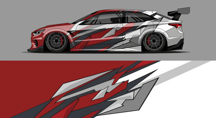 Fototapeta premium Sleek race car with dynamic red and gray geometric graphics and a prominent rear wing for high performance on the track.