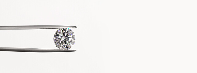 Diamond jewelry concept using tweezers for close-up detail shots © Levon