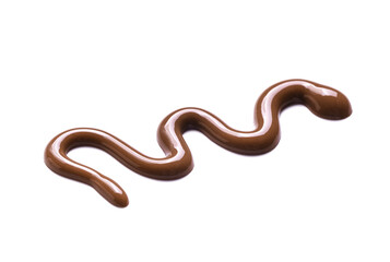 Fototapeta premium Melted chocolate zigzag on white background