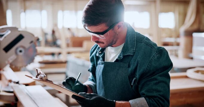 Man, carpenter and writing with clipboard for checklist, furniture or timber project in workshop. Male person, inventory and material inspection with list for online order or carpentry distribution