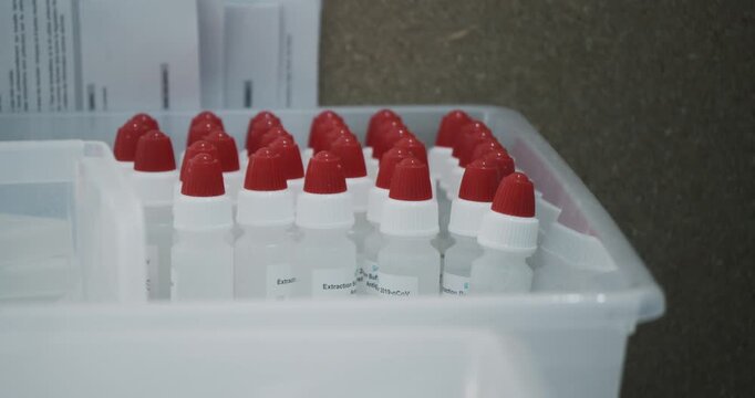 Extraction buffer tubes in corona test laboratory Berlin 2020