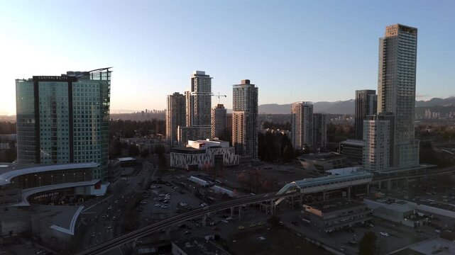 Urban Skyline In Surrey, British Columbia, Canada At Sunset - Drone Shot
