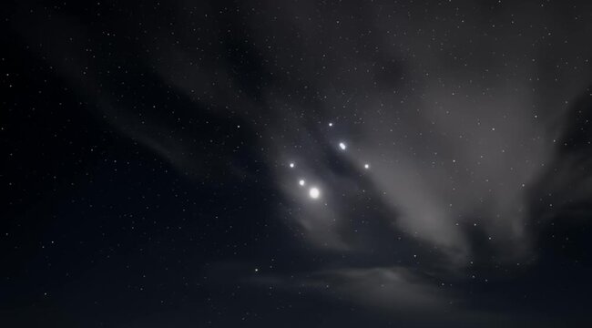 Night sky with stars and some clouds, creating a beautiful starlit scene