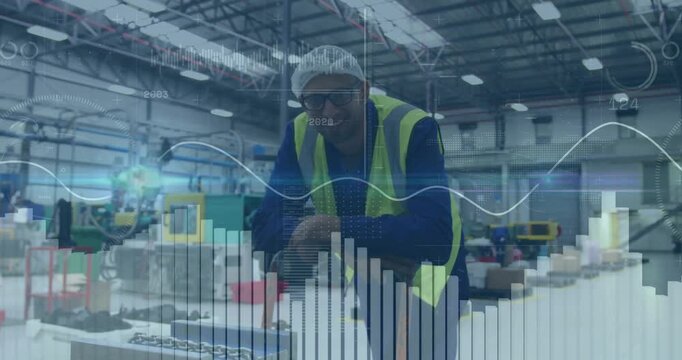 Animation of graphs, circles, worker taking support of trolley and standing in factory