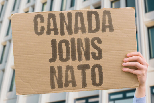 "Canada Joins NATO" Canada committing more fully to NATO obligations marks a turning point in how the country sees its role in the current global order. CANADA. ARMING. MILITARY. DEFENSE. GLOBAL.
