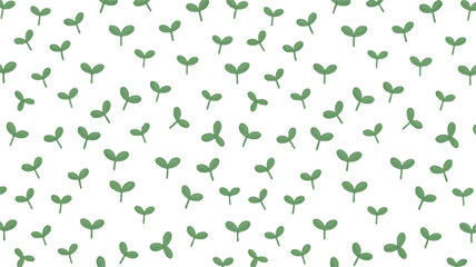 Fototapeta premium seeds sprouting green leaves on white background