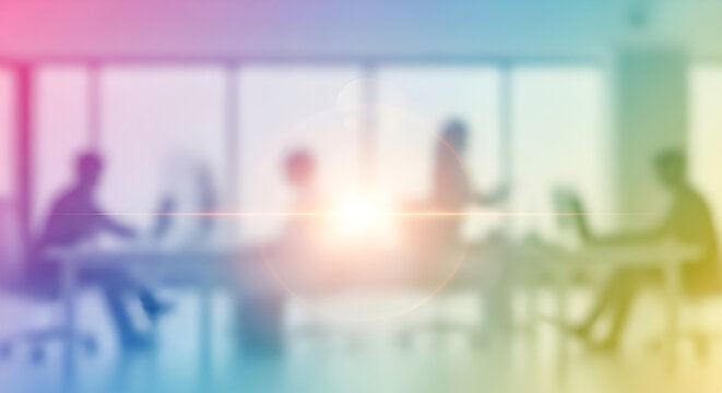 Abstract blurred office background with people working vibrant gradient lens flare