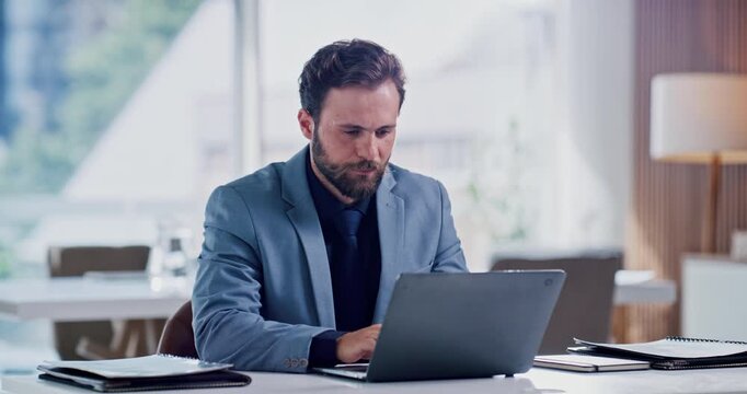 Business, man and typing on laptop in office for record keeping, internal auditing and payroll. Serious, accountant and tech at finance firm for tax preparation, compliance report and account review