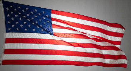 Obraz premium American Flag Blowing in the Wind: Patriotic Symbolism, Focus on Freedom and National Pride.